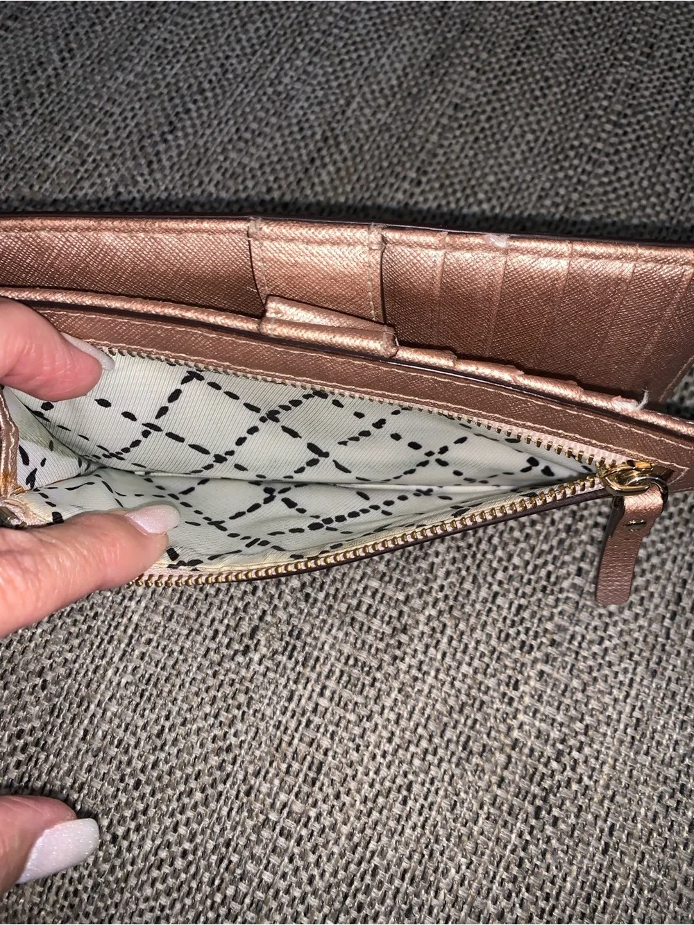 Kate Spade rose gold wallet with callouts